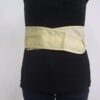 A woman wears a Moxa heat pack.